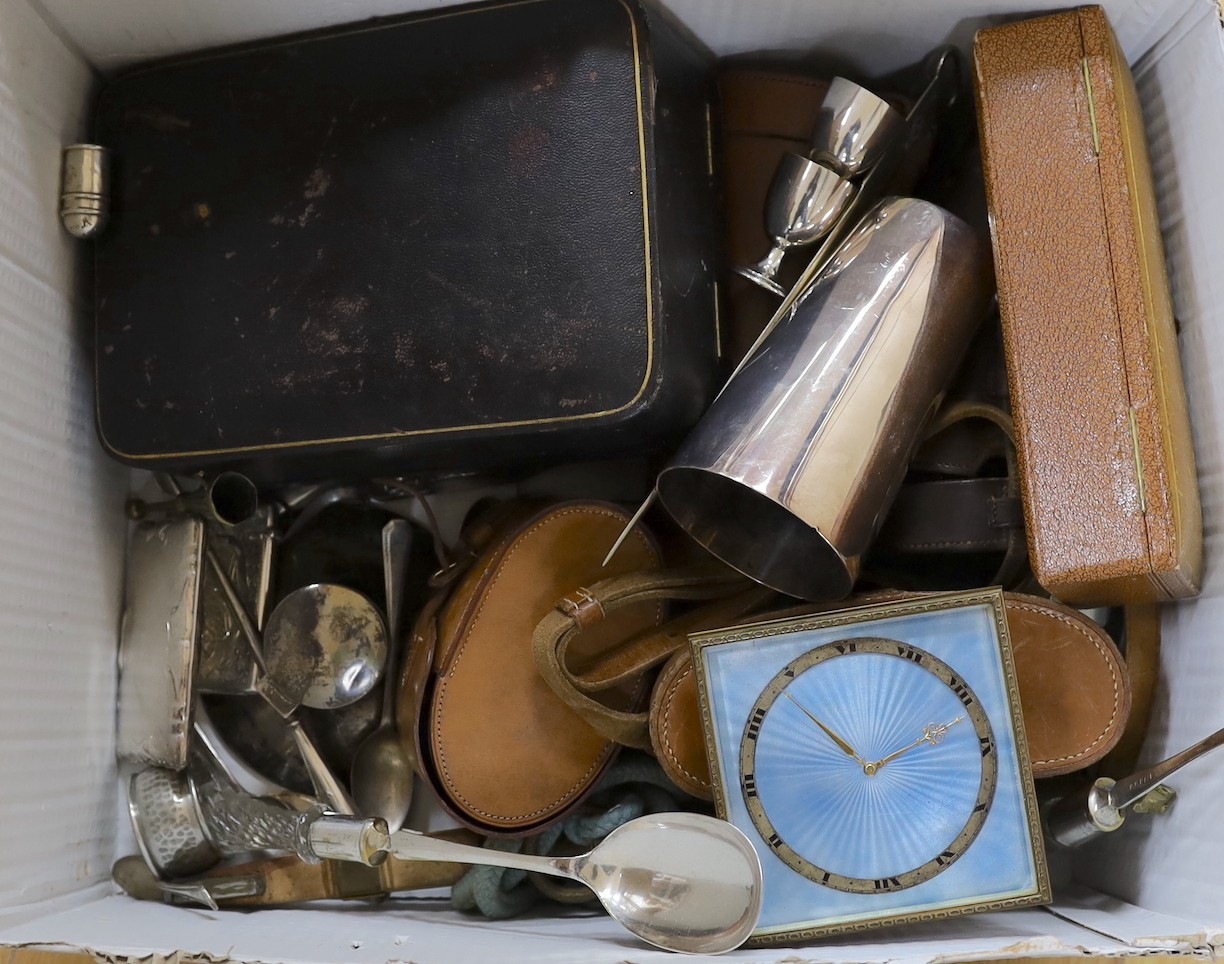 A George V silver capstan inkwell and a cased silver hair brush, two leather cased plate mounted glass flasks and tumbler sets, a George V cased silver christening bowl and mug set, a leather cased pair of silver hair br